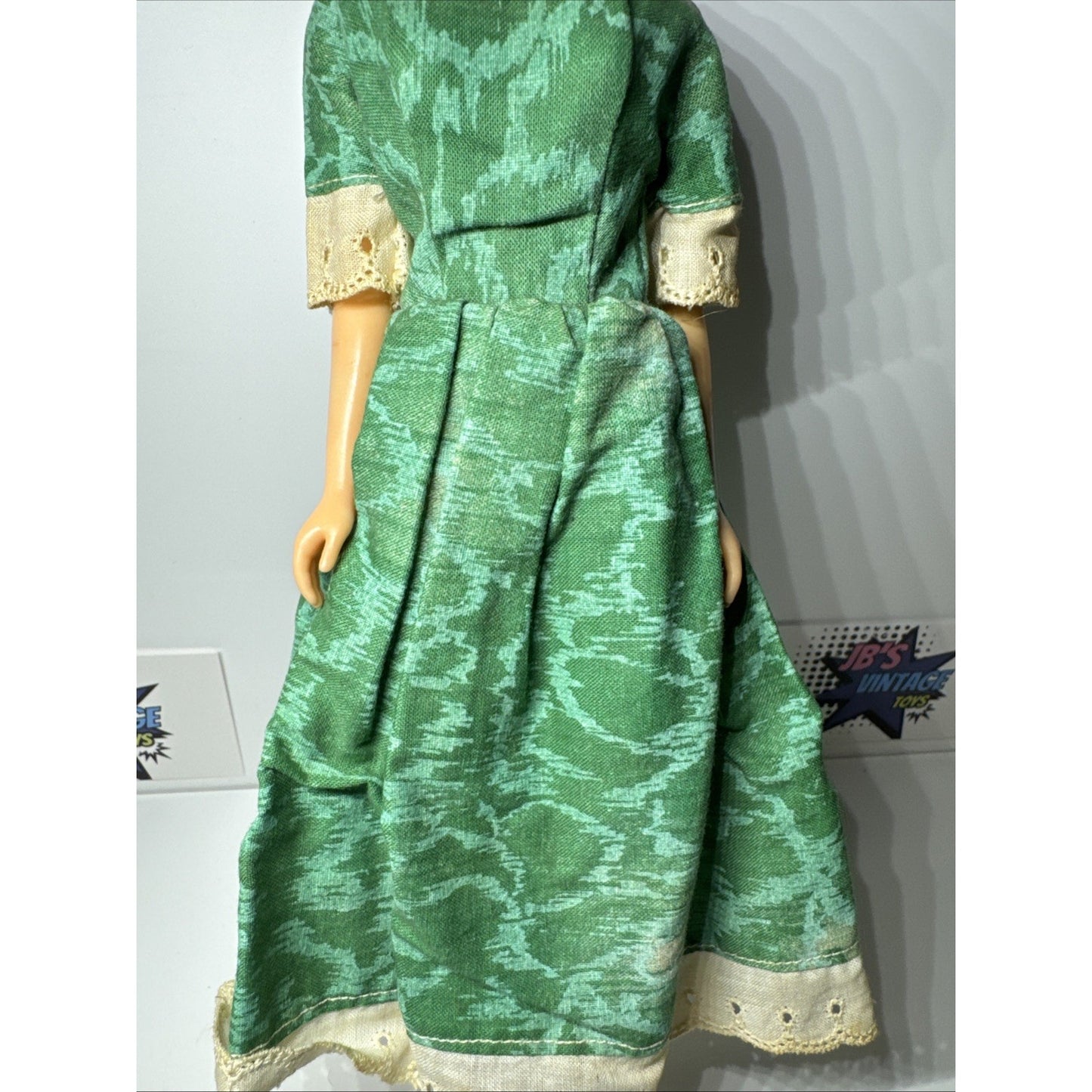 Vintage 1960’s Barbie Bubblecut Blonde wearing Green Sheath Dress